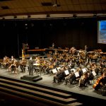 Banda Sinfônica do Conservatório apresenta concerto com seis solistas